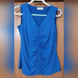 Calvin Klein sleeveless shell, like new.